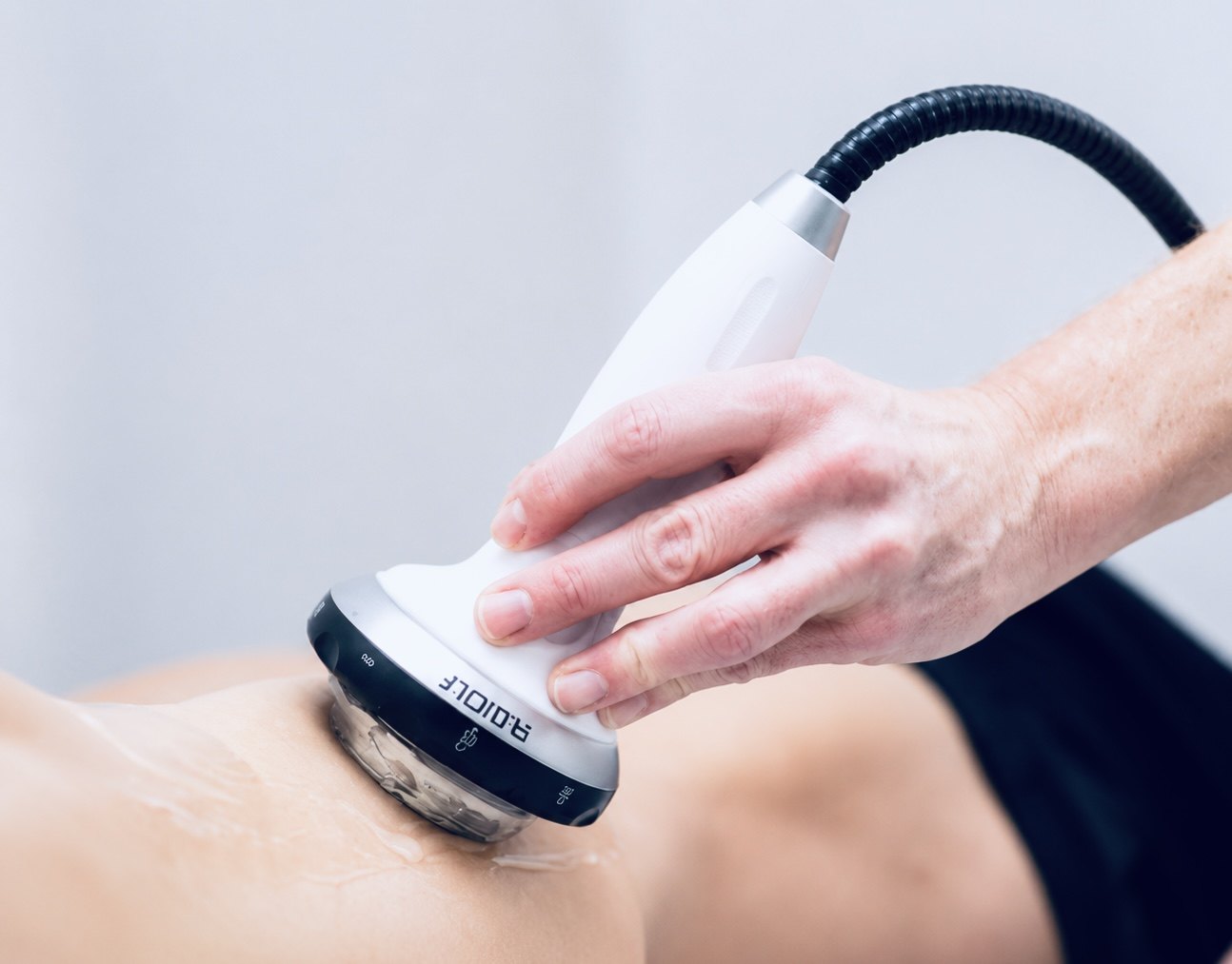 Radial shockwave therapy applied to a patient at Texas Functional Health Centers in Dallas, TX