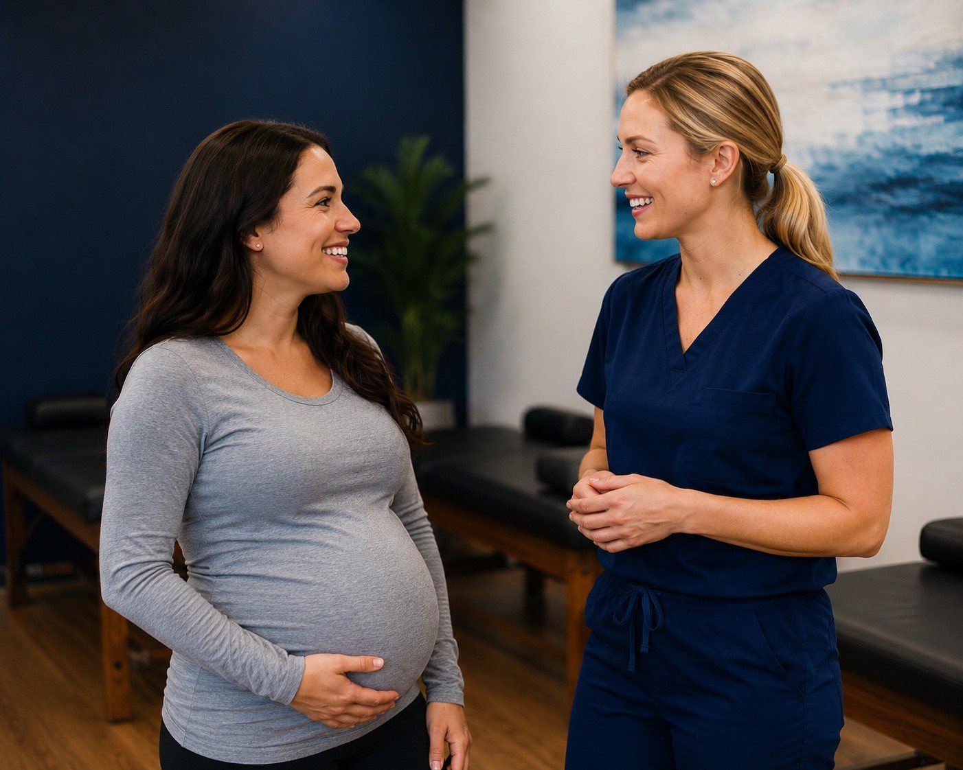 A TRUForm provider talking with an expecting mother at Texas Functional Health Centers in Dallas, TX